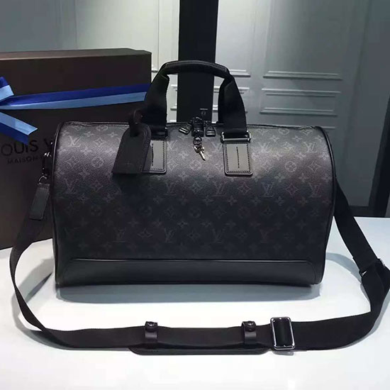 Louis Vuitton монограм затъмнение платно Keepall Voyager M43038