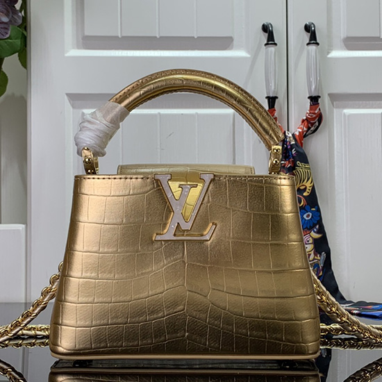 Louis Vuitton релефен крокодил Capucines мини злато N81190